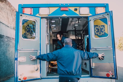 Paramedic opening the ambulance doors